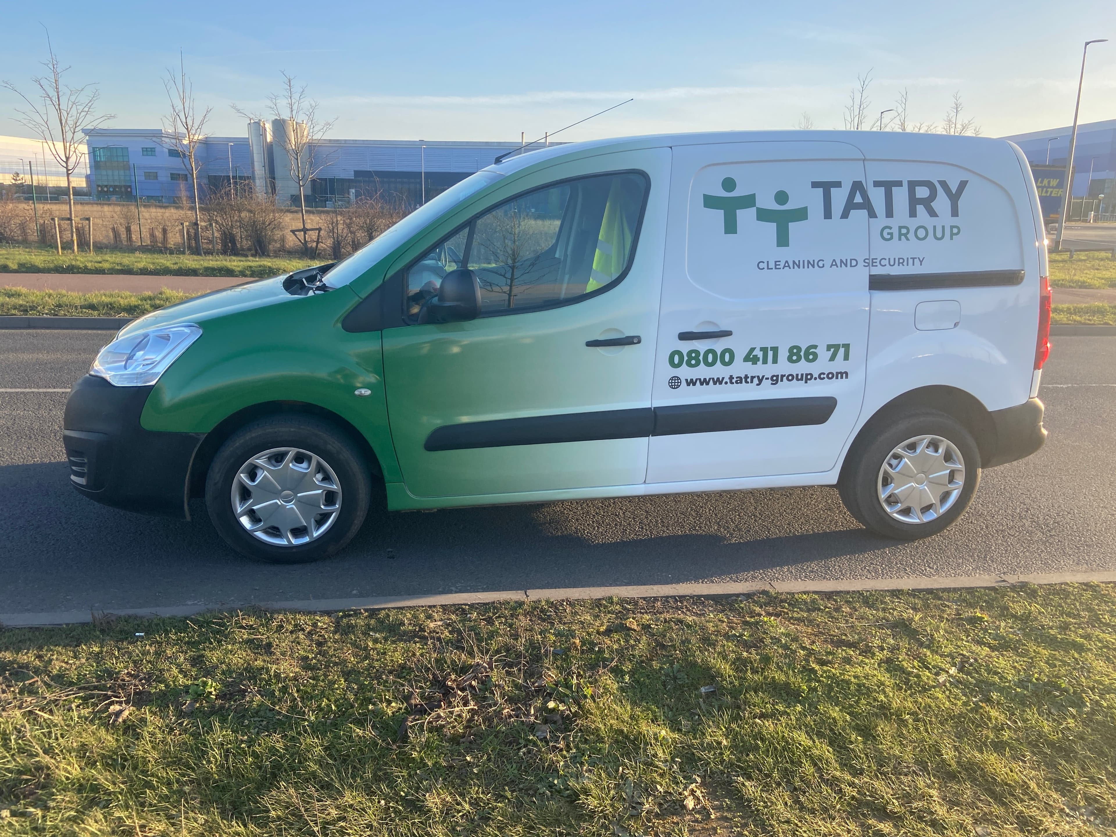 A branded Tatry Group cleaning and security van